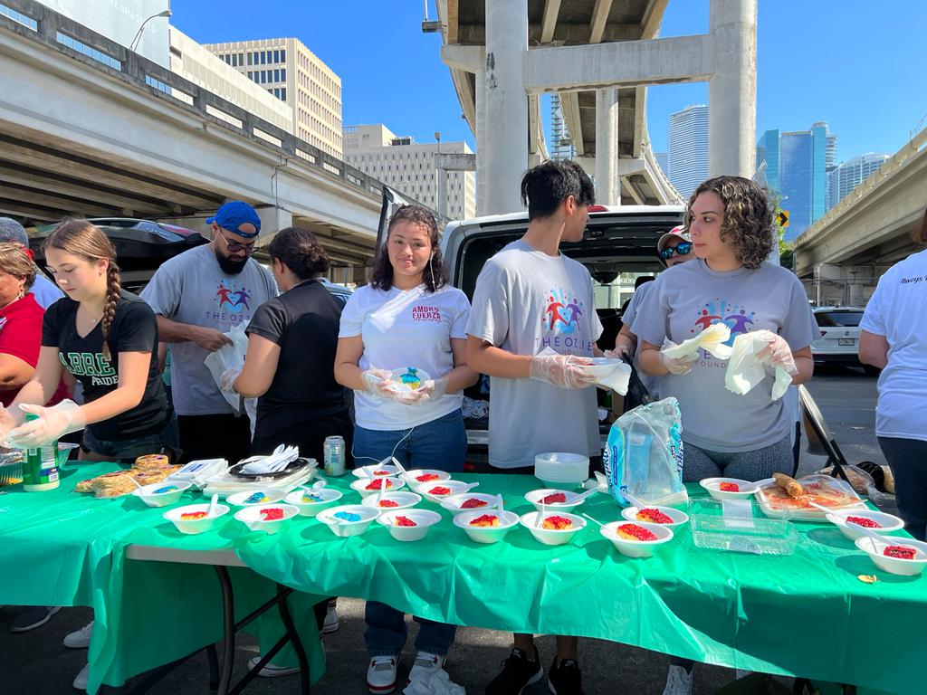 Smiling children receiving toys
